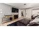 Cozy living area features a fireplace, comfortable seating, and tile flooring at 317 W Tonopah Dr # 2, Phoenix, AZ 85027