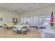 Spacious community room featuring tables, chairs, and plenty of natural light, creating an inviting gathering space at 3345 E University Dr # 73, Mesa, AZ 85213