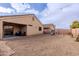 Well-maintained backyard showcasing the covered patio and playset at 34195 N Alison Dr, San Tan Valley, AZ 85144