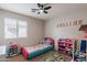 bedroom with bed and lots of toys at 34195 N Alison Dr, San Tan Valley, AZ 85144
