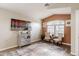 Stylish living room with natural light, neutral paint, wood-look floors, and accent wall at 34195 N Alison Dr, San Tan Valley, AZ 85144