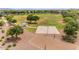 A well-maintained park featuring a basketball court, volleyball court, picnic area, and lush green space for outdoor activities at 34195 N Alison Dr, San Tan Valley, AZ 85144