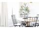 Bright dining room with elegant round table, stylish chairs, and natural light, perfect for meals at 3500 N Hayden Rd # 2103, Scottsdale, AZ 85251
