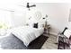 Spacious main bedroom featuring a stylish bed, modern decor, and natural light for relaxation at 3500 N Hayden Rd # 2103, Scottsdale, AZ 85251