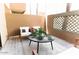 Outdoor patio space featuring stylish seating, decor, and concrete flooring at 3500 N Hayden Rd # 2103, Scottsdale, AZ 85251