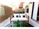 Outdoor patio space featuring stylish seating, decor, and concrete flooring at 3500 N Hayden Rd # 2103, Scottsdale, AZ 85251