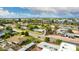 Overhead view of neighborhood featuring well-maintained lawns, mature trees, and tidy landscaping on a clear, sunny day at 370 E Redfield Rd, Chandler, AZ 85225