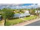 Overhead view of a home with a well-kept lawn, landscaping, and welcoming curb appeal at 370 E Redfield Rd, Chandler, AZ 85225