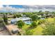 Overhead view of the property with a pool, surrounded by lush greenery and trees in the backyard at 370 E Redfield Rd, Chandler, AZ 85225