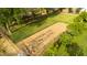 An aerial of a backyard featuring an enclosed dirt garden and lush lawn, providing ample space for gardening and outdoor activities at 370 E Redfield Rd, Chandler, AZ 85225