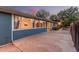 Back of house with large windows, on a spacious, partially covered patio area at 370 E Redfield Rd, Chandler, AZ 85225