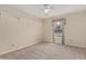 This bedroom features carpet flooring, baseboard trim and a window with curtains at 370 E Redfield Rd, Chandler, AZ 85225