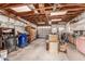 Cluttered garage filled with tools, storage, and various household items at 370 E Redfield Rd, Chandler, AZ 85225