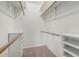 This walk-in closet has wire shelves and storage for your wardrobe and more at 370 E Redfield Rd, Chandler, AZ 85225