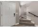 Bright entryway with updated flooring, neutral walls, and stairs leading to the next level at 4002 E Melinda Ln, Phoenix, AZ 85050