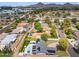 Aerial view of property in a residential neighborhood showcasing mature landscaping, pool, and solar panels at 4408 N 28Th Pl, Phoenix, AZ 85016