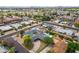 Aerial view of property and neighborhood featuring a pool, solar panels and mature landscaping at 4408 N 28Th Pl, Phoenix, AZ 85016