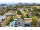 A real estate picture showing the property with a pool, green backyard, and solar panels at 4408 N 28Th Pl, Phoenix, AZ 85016