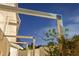View of backyard with wooden pergola, block wall, and growing plants at 4408 N 28Th Pl, Phoenix, AZ 85016
