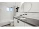 Clean bathroom with tiled shower/tub combo, black accents and a modern vanity at 4408 N 28Th Pl, Phoenix, AZ 85016