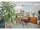 Well-lit dining room with modern chandelier, large windows, and stylish furniture at 4408 N 28Th Pl, Phoenix, AZ 85016