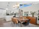Modern dining area adjacent to a sleek kitchen, offering a seamless flow for entertaining guests and Gathering at 4408 N 28Th Pl, Phoenix, AZ 85016