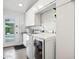 Functional laundry room with modern appliances and ample storage space at 4408 N 28Th Pl, Phoenix, AZ 85016