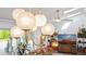 Bright living room featuring a modern chandelier, comfortable seating, and stylish decor at 4408 N 28Th Pl, Phoenix, AZ 85016