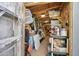 Interior of cluttered outdoor shed filled with miscellaneous storage items at 4408 N 28Th Pl, Phoenix, AZ 85016