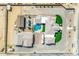 Top down aerial view of a desert property with a home, RV parking, pool, and playground at 447 W Judd Rd, San Tan Valley, AZ 85143