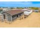 An aerial view of the barn area of the desert property at 447 W Judd Rd, San Tan Valley, AZ 85143