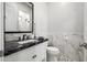 Stylish powder room featuring a modern vanity, elegant fixtures, and chic marble accents at 447 W Judd Rd, San Tan Valley, AZ 85143