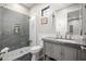Modern bathroom with a walk-in shower, stylish vanity, and sleek fixtures at 447 W Judd Rd, San Tan Valley, AZ 85143