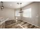 Cozy dining area with stylish lighting and a view of the backyard at 447 W Judd Rd, San Tan Valley, AZ 85143