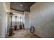 Outdoor patio features decorative flooring, overhead lighting, and three standing outdoor heaters at 447 W Judd Rd, San Tan Valley, AZ 85143