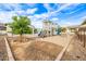 Community playground with climbing structure, slides, and swings, perfect for outdoor fun at 447 W Judd Rd, San Tan Valley, AZ 85143