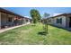 Landscaped exterior view showcasing well-maintained grounds and inviting curb appeal at 4502 E Carol Ave # 1, Mesa, AZ 85206