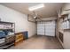 Spacious garage with ample storage shelving, offering plenty of room for vehicles and storage at 4502 E Carol Ave # 1, Mesa, AZ 85206