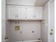 Functional laundry room with ample cabinet space and utility connections at 4502 E Carol Ave # 1, Mesa, AZ 85206
