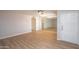 Comfortable living room with wood-look floors, closet and an inviting entrance door at 4502 E Carol Ave # 1, Mesa, AZ 85206