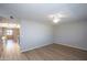 Open-concept room showcasing hard surface flooring and inviting view to kitchen at 4502 E Carol Ave # 1, Mesa, AZ 85206