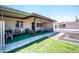 Inviting covered patio area with seating, perfect for enjoying the outdoors and entertaining guests at 4502 E Carol Ave # 1, Mesa, AZ 85206