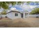 Backyard featuring a covered patio with desert landscaping, enhancing outdoor appeal at 507 W Magdalena Ln, Phoenix, AZ 85041
