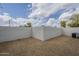 Backyard featuring a gravel landscape, cinder block perimeter wall, and an installed air conditioning unit at 507 W Magdalena Ln, Phoenix, AZ 85041
