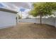 Backyard featuring desert landscaping and a privacy wall, offering a serene outdoor space at 507 W Magdalena Ln, Phoenix, AZ 85041