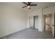 Neutral bedroom features a ceiling fan and mirrored closet at 507 W Magdalena Ln, Phoenix, AZ 85041