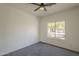 Bedroom featuring a large window with neighborhood views at 507 W Magdalena Ln, Phoenix, AZ 85041