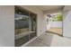 Covered patio with a fan and slider, connecting indoor and outdoor living spaces seamlessly at 507 W Magdalena Ln, Phoenix, AZ 85041