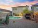 Backyard featuring a pool, desert landscaping, and home exterior with large windows at 5110 E Peak View Rd, Cave Creek, AZ 85331