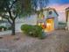 Inviting home with mature landscaping, a two-car garage, and a welcoming entrance at 5110 E Peak View Rd, Cave Creek, AZ 85331